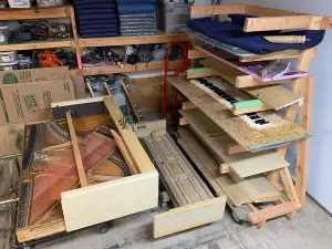Baldwin spinet disassembled for shop repairs.