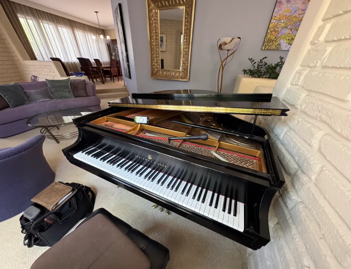 Tuning a Steinway grand in Moriarty, NM.