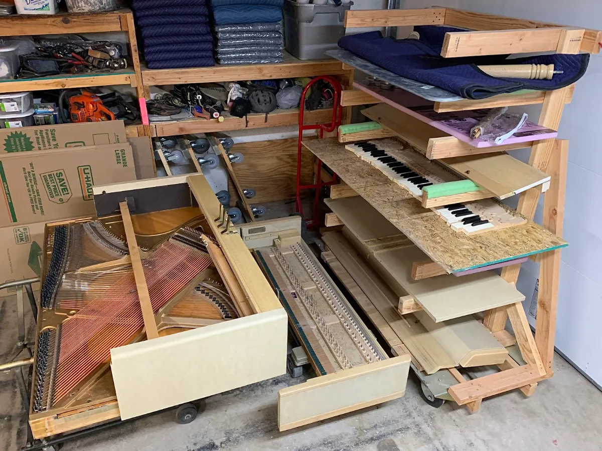 Baldwin spinet piano fully disassembled in Tom Lepinski's ABQ shop.